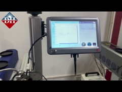 Μηχανή σήμανσης λέιζερ με ιπτάμενες ίνες με χρονολογία χαραγμένη στο κάτω μέρος του κουτιού